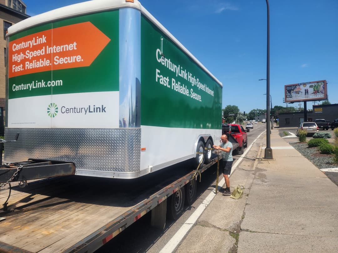 Fallen tree cut into sections during professional removal service in Cleveland yard